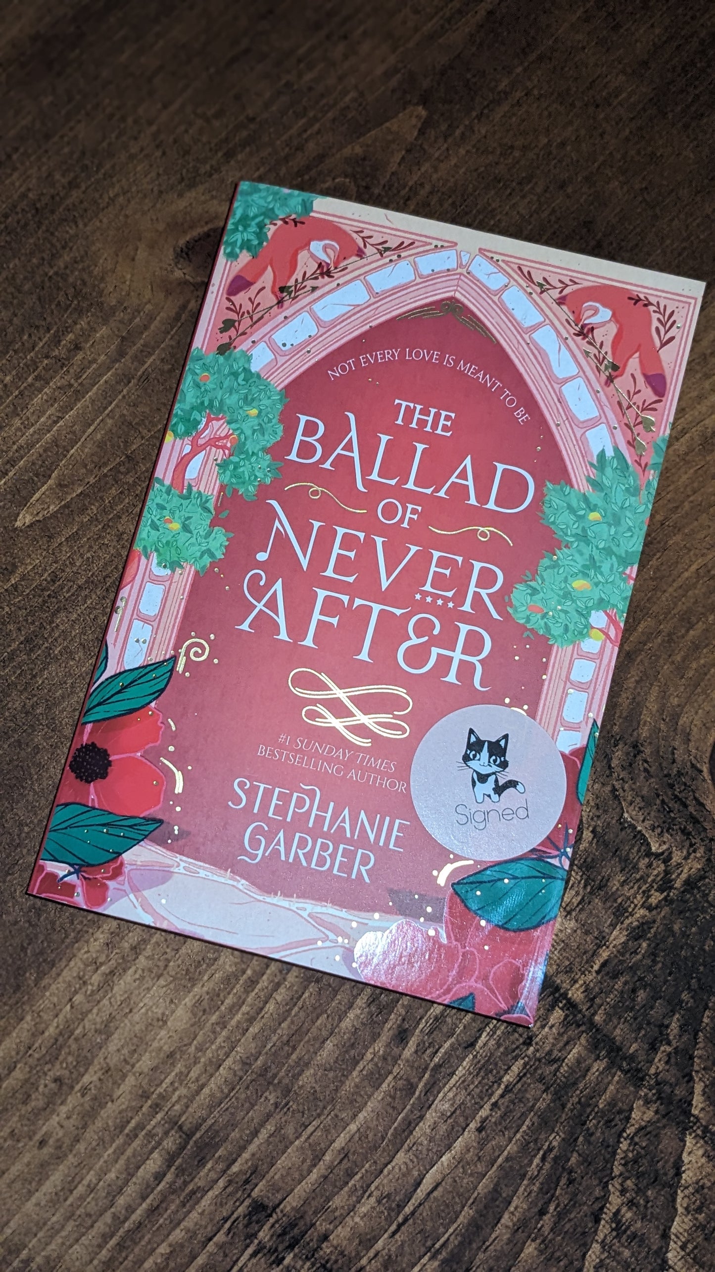 Signed The Ballad of Never After by Stephanie Garber
handpainted fore-edge painting sprayed edges special edition