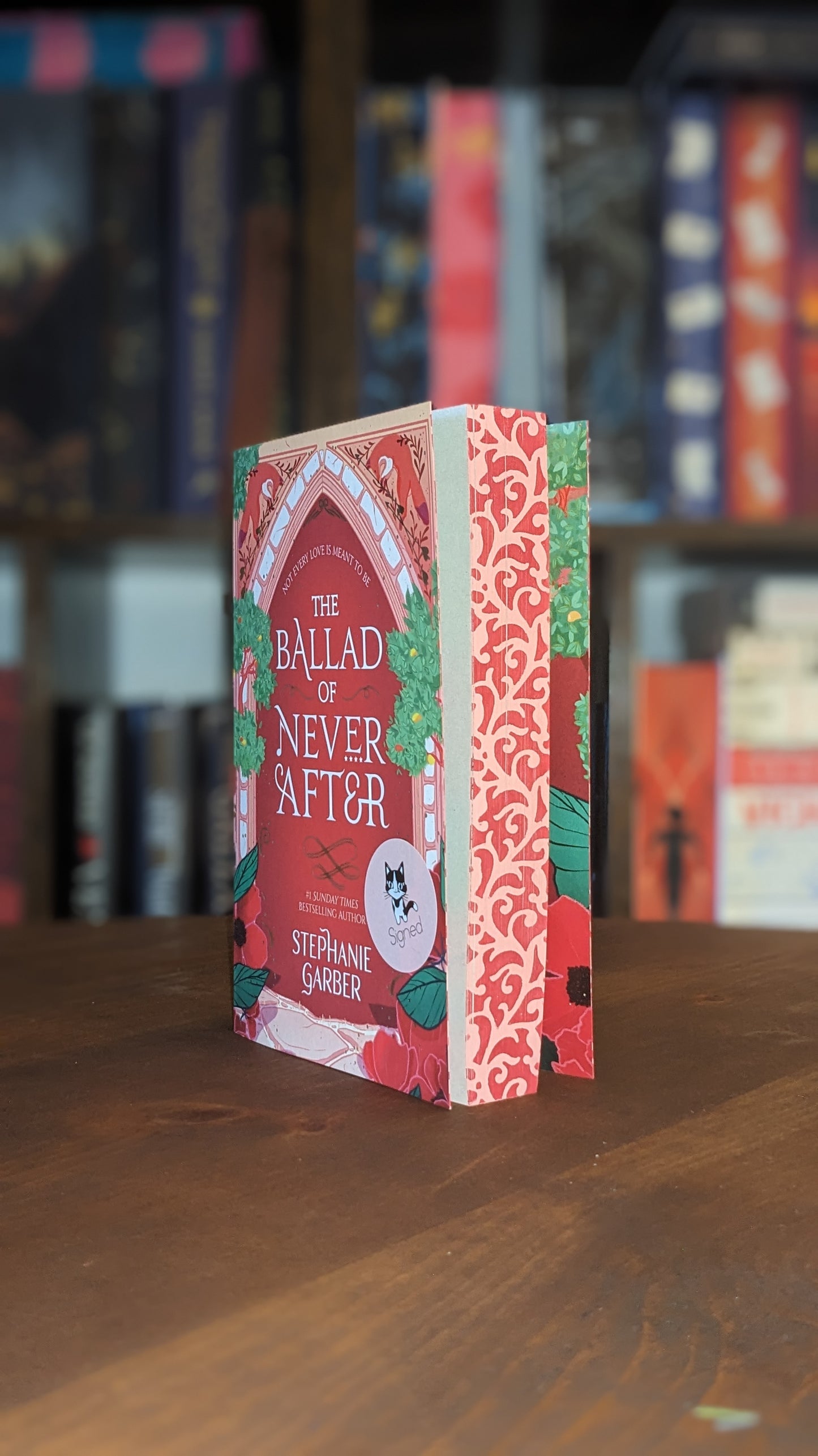 Signed The Ballad of Never After by Stephanie Garber
handpainted fore-edge painting sprayed edges special edition