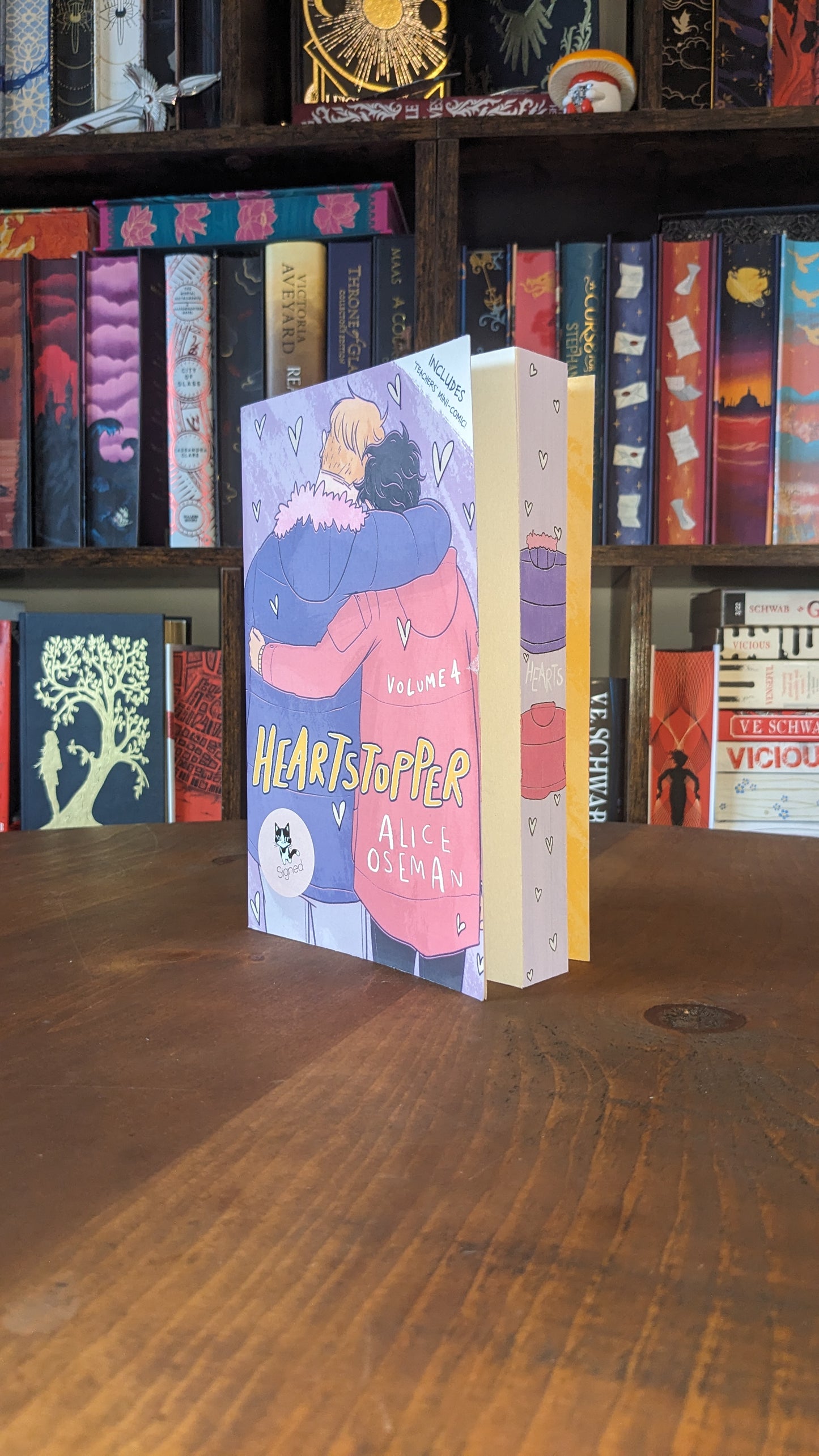 Signed Heartstopper volume 4 by Alice Osman PeggysPages fore-edge painting sprayed edges special editions