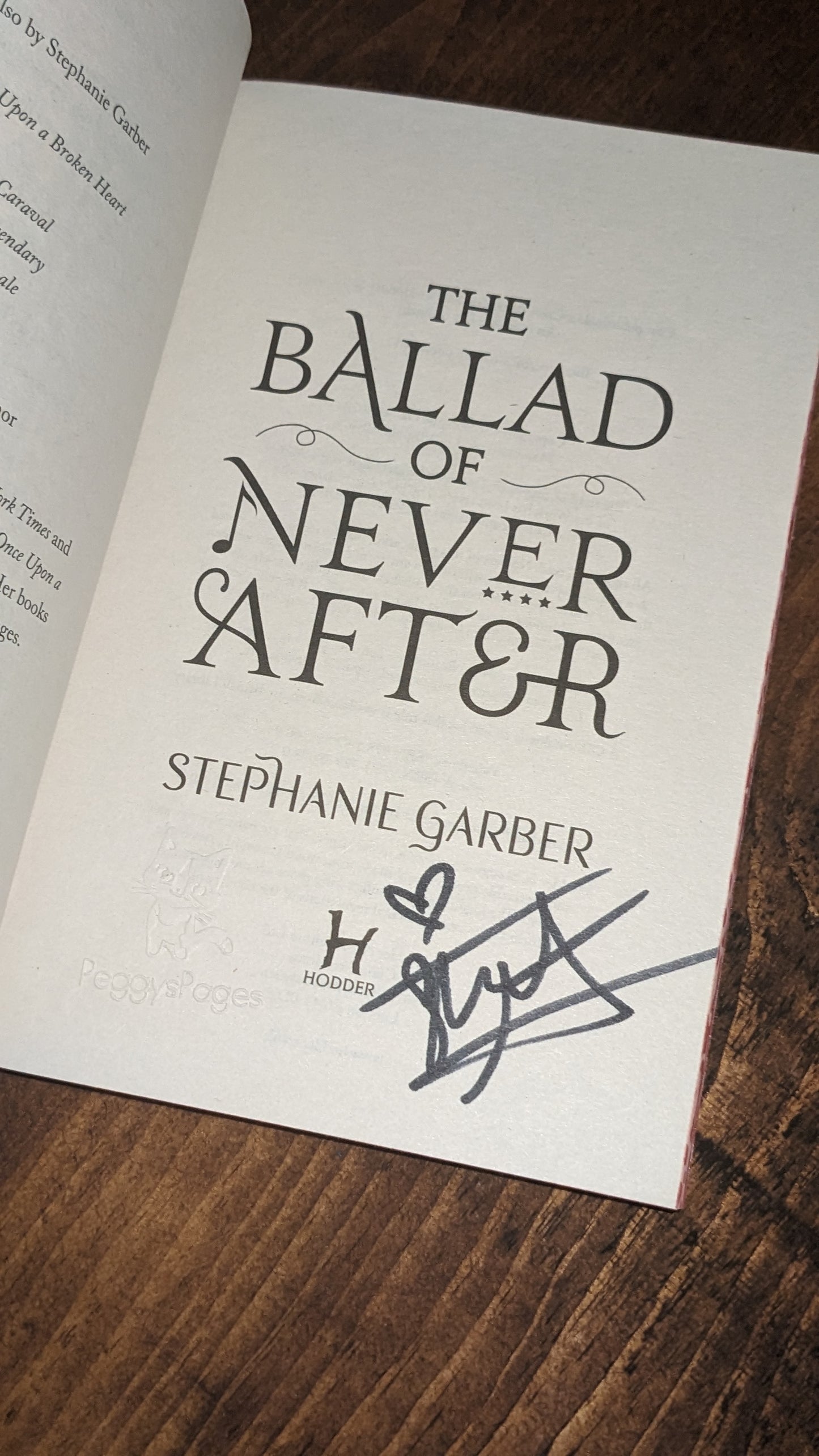 Signed The Ballad of Never After by Stephanie Garber
handpainted fore-edge painting sprayed edges special edition